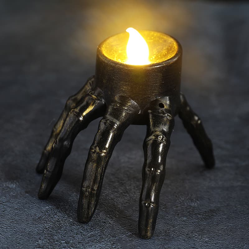 Bougie LED sur Main de Squelette (Halloween)